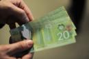 The Canadian dollar hit a 10-year low against the US greenback Wednesday on weaker growth prospects and the Bank of Canada's interest rate cut last week