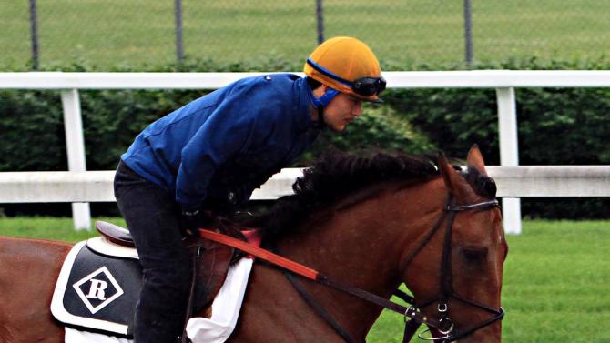 Belmont Stakes hopeful Keen Ice, ridden by exercise rider Faustino ...