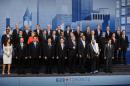 Heads of states and governments and other dignitaries pose for a picture during the G20 summit on June 27, 2010 at the convention center in Toronto, Canada