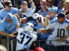 Tennessee Titans' Tommie Campbell celebrates with fans after scoring a touchdown on a 65-yard punt return against the Detroit Lions in the first quarter of an NFL football game, Sunday, Sept. 23, 2012, in Nashville, Tenn. (AP Photo/Joe Howell)