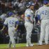 Kansas City Royals relief pitcher Kelvin Herrera, left, is relieved after allowing consecutive runs by the Atlanta Braves during the eighth inning of a baseball game, Tuesday, April 16, 2013, in Atlanta. (AP Photo/John Amis)