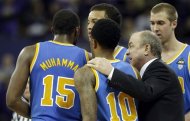 UCLA head coach Ben Howland talks with players, including Shabazz Muhammad (15), and Larry Drew II (10) late in the second half of an NCAA college basketball game against Washington, Saturday, March 9, 2013, in Seattle. UCLA beat Washington 61-54. (AP Photo/Ted S. Warren)