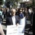 Hundreds of Cypriot bank workers protest against the possibility of their pensions being affected should the government decide to restructure Cyprus' two largest banks, outside parliament in Nicosia