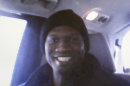 FILE - This undated cell phone photo provided by Kristi Kinard Suthamtewakul shows a smiling Aaron Alexis, the gunman in the Monday, Sept. 16, 2013 shooting rampage at at the Washington Navy Yard that killed 12, in Fort Worth, Texas. Alexis lied about a previous arrest when he applied for a security clearance in the Navy, and also failed to disclose thousands of dollars in debts, according to Navy report released Monday, Sept. 23, 2013. (AP Photo/Kristi Kinard Suthamtewakul, File)
