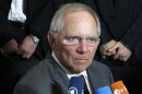 Germany's Finance Minister Schaeuble talks to the media as he arrives to attend an eurozone finance ministers meeting in Luxembourg