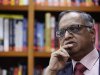 N. R. Narayana Murthy, founder and chairman of Infosys, listens to a question during an interview with Reuters at the company's office in Bangalore