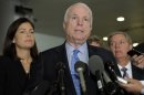 Sen. John McCain, R-Ariz., ranking Republican on the Senate Armed Services Committee, center, flanked by fellow committee members, Sen. Kelly Ayotte, R-N.H., left, and Sen. Lindsey Graham, R-S.C., right, speaks on Capitol Hill in Washington, Tuesday, Nov. 27, 2012, following a meeting with UN Ambassador Susan Rice. Rice met with lawmakers to discuss statements she made about the attack on the U.S. Consulate in Libya that left the ambassador and three other Americans dead. (AP Photo/Susan Walsh)