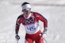 Norway's Marit Bjoergen arrives in the finish during the women's 10K classical-style cross-country race at the 2014 Winter Olympics, Thursday, Feb. 13, 2014, in Krasnaya Polyana, Russia. (AP Photo/Matthias Schrader)
