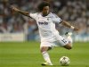 Real Madrid's Marcelo shoots towards the goal during his Champions League Group D soccer match against Manchester City at the Santiago Bernabeu stadium in Madrid