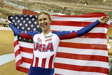 Photo: USA's Sarah Hammer reacts as she wins the gold medal during women's omnium time trial final at the 2013 UCI Track Cycling World Championships in Minsk. 