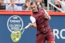 Nick Kyrgios of Australia returns the ball to Fernando Verdasco of Spain during day two of the Rogers Cup at Uniprix Stadium on August 11, 2015 in Montreal, Quebec, Canada