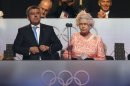 Britain's Queen Elizabeth II, right, declares the games open alongside International Olympic Committee Vice President Thomas Bach during the Opening Ceremony at the 2012 Summer Olympics, Saturday, July 28, 2012, in London. (AP Photo/Cameron Spencer, Pool)
