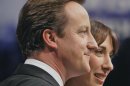 FILE This Wednesday, Oct. 3, 2007 file photo shows David Cameron, leader of Britain's opposition Conservative Party with his wife Samantha, after he delivering his keynote speech on the last day of the annual Conservative Party conference in Blackpool, England. British Prime Minister David Cameron's office confirmed Monday June 11, 2012 that the prime minister accidentally left his 8-year-old daughter Nancy in a pub after a family Sunday lunch near his country home, west of London. They said the incident happened a few months ago as the family was leaving the pub. Cameron was travelling in one car with his bodyguards and assumed that Nancy was in the other car with his wife Samantha and two other children. Samantha assumed the child was with her father and only realized she was missing when they got home.(AP Photo/Kirsty Wigglesworth, File)