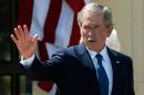 Former President George W. Bush waves goodbye on April 25, 2013 in Dallas, Texas