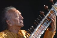 FILE - In this July 19, 2005 file photo, Indian musician Ravi Shankar performs during the opening day of the Paleo Festival, in Nyon, Switzerland. Shankar, the sitar virtuoso who became a hippie musical icon of the 1960s after hobnobbing with the Beatles and who introduced traditional Indian ragas to Western audiences over an eight-decade career, died Tuesday, Dec. 11, 2012. He was 92. (AP Photo/Keystone, Sandro Campardo, File)