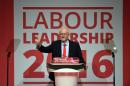 Jeremy Corbyn celebrates his victory following the announcement of the winner in the Labour leadership contest between him and Owen Smith at the ACC Liverpool. England Saturday Sept, 24, 2016. (Danny Lawson/PA via AP)