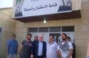 U.S. Senator John McCain meets with FSA fighters and SETF Executive Director Mouaz Moustafa during a surprise visit to Syria