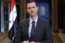 Syria's President Bashar al-Assad speaks during an interview with Venezuelan state television TeleSUR in Damascus