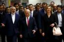 Iranian FM Zarif, IAEA Director General Amano and the High Representative of the European Union for Foreign Affairs and Security Policy Mogherini arrive at the United Nations building in Vienna
