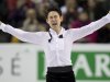 Denis Ten, from Kazakhstan, celebrates after his free skate program in the men's competition at the World Figure Skating Championships Friday, March 15, 2013 in London, Ontario. Ten won the silver medal. (AP Photo/The Canadian Press, Paul Chiasson)