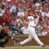 St. Louis Cardinals' Matt Carpenter (13) watches the ball as he hits a two-run home run during the third inning of Game 3 of baseball's National League championship series against the San Francisco Giants, Wednesday, Oct. 17, 2012, in St. Louis. (AP Photo/David J. Phillip)