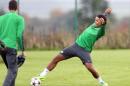 Celtic's player Virgil Van Dijk (R) takes part in a training session near Glasgow, Scotland, on October 21, 2013