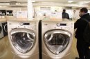 File image of shoppers look at durable goods appliances at a Home Depot store in New York