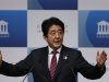 Japan's Prime Minister Shinzo Abe delivers a speech to business leaders and scholars during a meeting hosted by Japan Akademeia in Tokyo