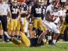 Alabama's Eddie Lacy tries to get past Notre Dame's Manti Te'o during the first half of the BCS National Championship college football game Monday, Jan. 7, 2013, in Miami. (AP Photo/John Bazemore)