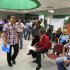 People are seen in a government-run employment office in the Andalusian capital of Seville