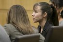 Jodi Arias listens as the verdict for sentencing is read for her first degree murder conviction at Maricopa County Superior Court in Phoenix
