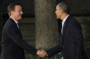 President Barack Obama shakes hands with Britain's Prime Minister David Cameron on arrival for the G8 Summit Friday, May 18, 2012 at Camp David, Md. (AP Photo/Charles Dharapak)