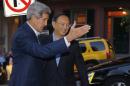 U.S. Secretary of State John Kerry welcomes China's State Councillor Yang Jiechi outside Kerry's home in Boston, Massachusetts