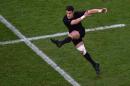 New Zealand's fly half Dan Carter kicks the ball during the final match of the 2015 Rugby World Cup between New Zealand and Australia at Twickenham stadium, south west London, on October 31, 2015