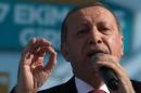 Turkish President Tayyip Erdogan gives a speech during an inauguration ceremony of a water pipeline project linking Turkey to northern Cyprus