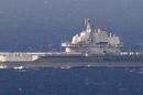 China's Kuznetsov-class aircraft carrier Liaoning sails the water in East China Sea, in this handout photo