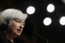 Federal Reserve Chair Janet Yellen speaks at the International Monetary Fund in Washington, Wednesday, July 2, 2014. Yellen said she doesn't see a need for the Fed to start raising interest rates to address the risk that extremely low rates could destabilize the financial system. (AP Photo/Susan Walsh)