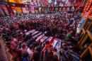 Members pray over flag-draped coffins of members of Iraq's Special Weapons and Tactics Team (SWAT) and Shiite militiamen during their funeral procession inside the holy Shiite shrine of Imam Hussein in the Shiite holy city of Karbala, 50 miles (80 kilometers) south of Baghdad, Iraq, Monday, Oct. 27, 2014. A suicide car bomber driving a military Humvee struck a checkpoint manned by Iraqi troops and pro-government Shiite militiamen in the Sunni town of Jurf al-Sakhar south of Baghdad on Monday, killing at least 24 people, officials said. (AP Photo/Ahmed al-Husseini)