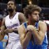 New Orleans Hornets center Robin Lopez, right, pulls in a rebound as Los Angeles Clippers' DeAndre Jordan watches during the first half of an NBA basketball game in Los Angeles, Wednesday, Dec. 19, 2012. (AP Photo/Chris Carlson)