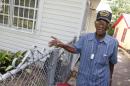 107-year-old Richard Overton, the oldest recorded living US veteran, surveys the backyard of his home after being presented with the Philips Lifeline with AutoAlert service on Wednesday, June 5, 2013 in Austin, Texas. The medical alert service, which will help protect Overton as he continues to remain independent in his home, was provided free of charge for the rest his life in appreciation for his courageous service to our country. Overton served for the Army in the Pacific during World War II.(Jack Plunkett / AP Images for Philips Lifeline)