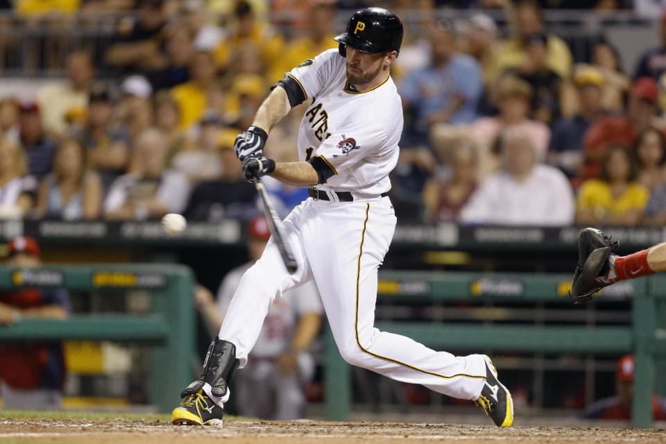 Davis homer in 8th lifts Pirates over Cardinals