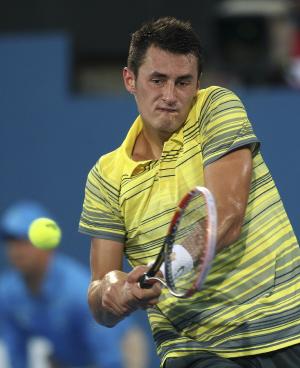 Tomic loses shortest match on record