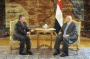 Egypt's interim President Mansour speaks with Jordan's King Abdullah during meeting at El-Thadiya presidential palace in Cairo