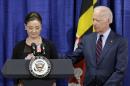 Vice President Joe Biden comforts sexual assault victims advocate Helena Lazaro as she pauses while recalling her experience as a victim of rape, Monday, March 16, 2015, at the Maryland State Police Forensic Science Laboratory in Pikesville, Md. The visit was to highlight $41 million in new federal funding intended to help law enforcement agencies across the country test hundreds of thousands of backlogged rape kits. (AP Photo/Patrick Semansky)