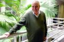 This Monday, March 24, 2014 photo shows director Errol Morris posing for a photo in Los Angeles. Morris directed the recently released film "The Unknown Known: The Life and Times of Donald Rumsfeld." Morris spent more than 30 hours interviewing Donald Rumsfeld. He sifted through thousands of memos _ 