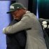 FILE - In this April 26, 2012,  file photo, North Carolina defensive end Quinton Coples, right, hugs NFL Commissioner Roger Goodell after being selected as the 16th pick overall by the New York Jets in the first round of the NFL football draft in New York. How many hugs can Roger Goodell endure from all the burly offensive and defensive players expected to be selected in the first round? Last year, he embraced many first-round picks who took the stage and was nearly hugged into submission_one of the things to watch for during the three-day NFL draft beginning Thursday, April 25, 2013. (AP Photo/Jason DeCrow, File)