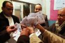 Officials count ballots after polls closed in Cairo