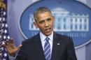 U.S. President Barack Obama participates in his last news conference of the year at the White House in Washington