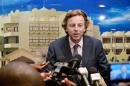 United Nations Special Envoy to Mali (MINUSMA) Bert Koenders answers the media following a meeting with Burkina Faso's President on October 4, 2013 in Ouagadougou