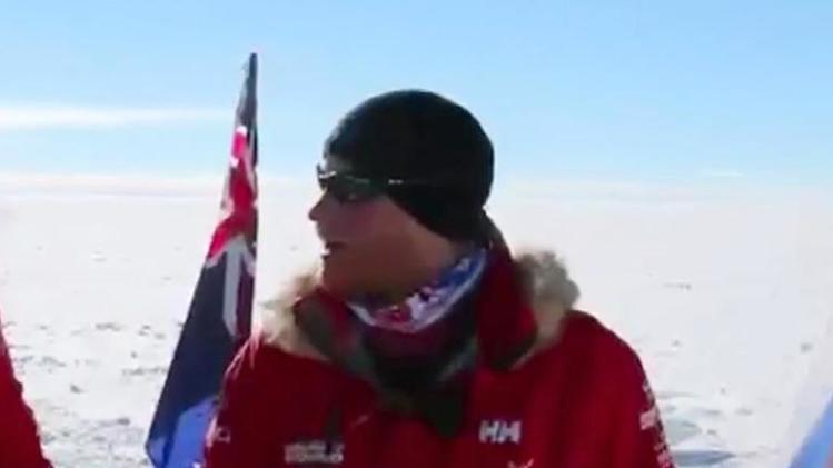 A handout video grab, received via a British Press Pool by Walking with the Wounded (WWTW), shows Prince Harry reaching the South Pole in Antartica on December 13, 2013, with the Walking With The Wounded charity trek